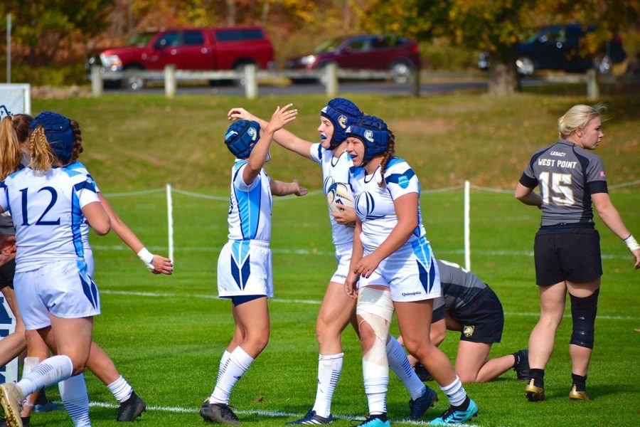 Photo: Kayley Fasoli |

Allison Koenig celebrates with her teammates during Rugby’s contest against Army West Point.