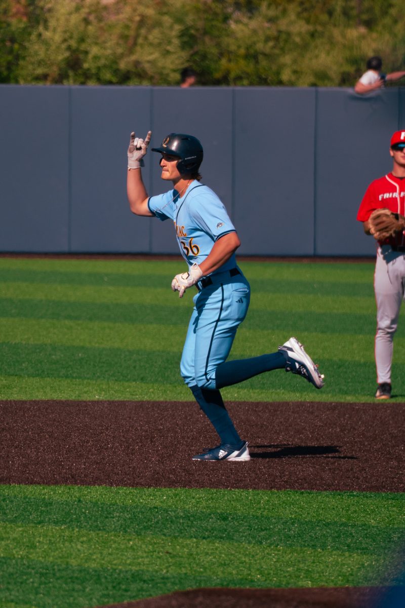 James Marino celebrates after launching a home run on Friday.